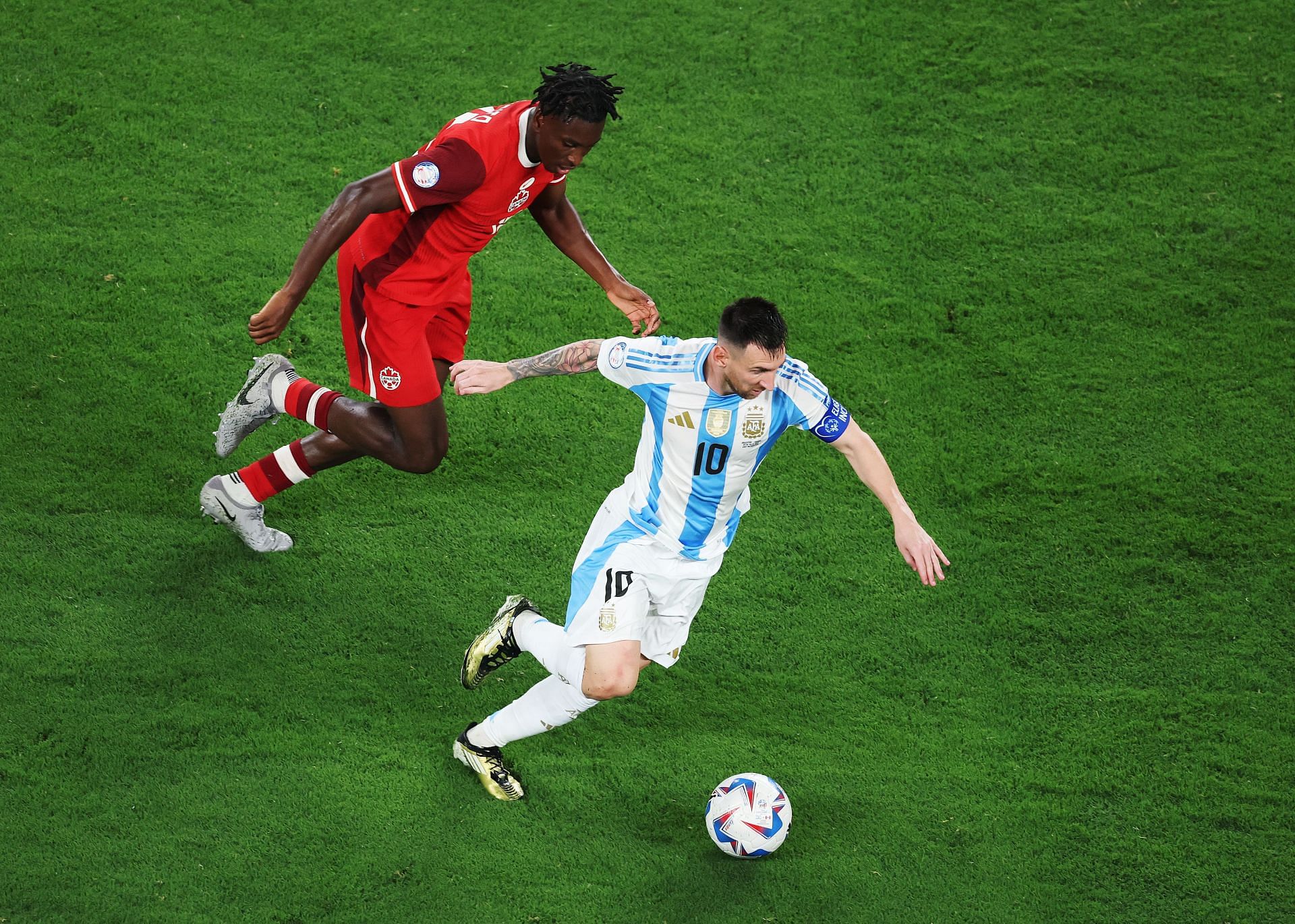 Lionel Messi in action vs Canada (Photo by Al Bello/Getty Images)